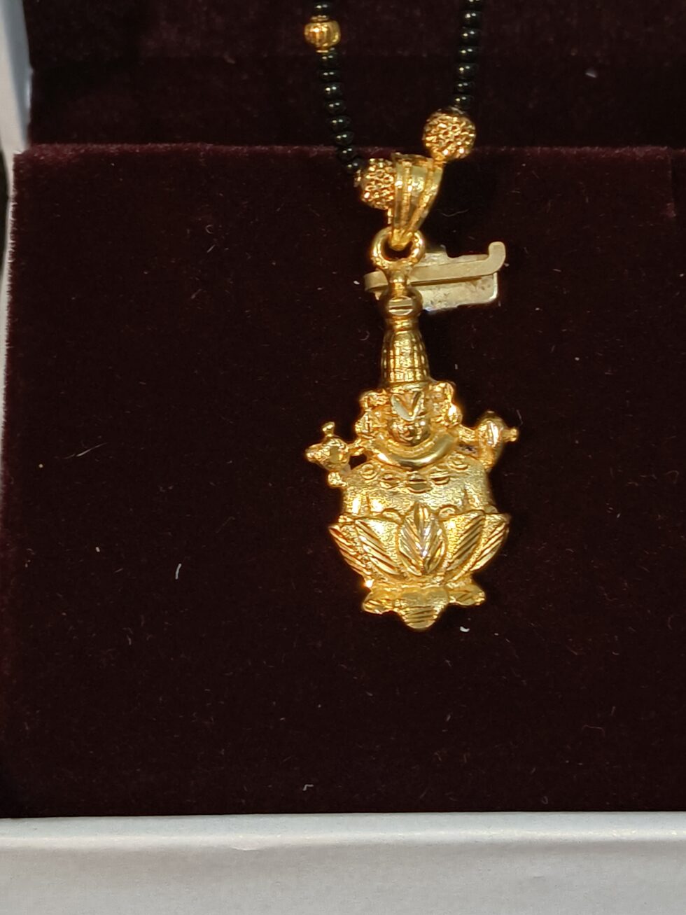 Lord Brahma gold and black beaded necklace
