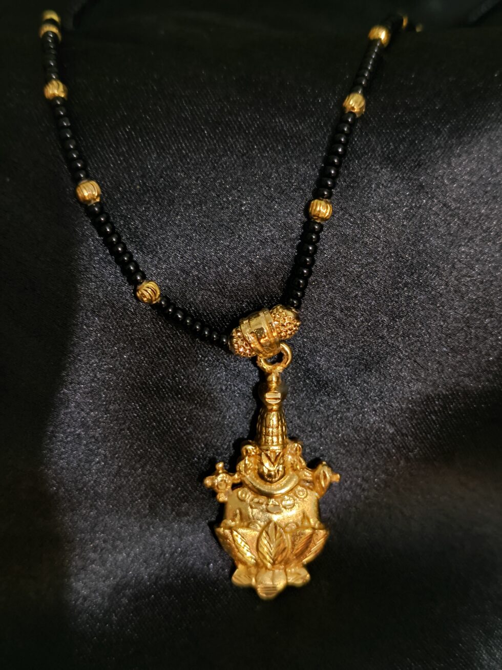Lord Brahma gold and black beaded necklace