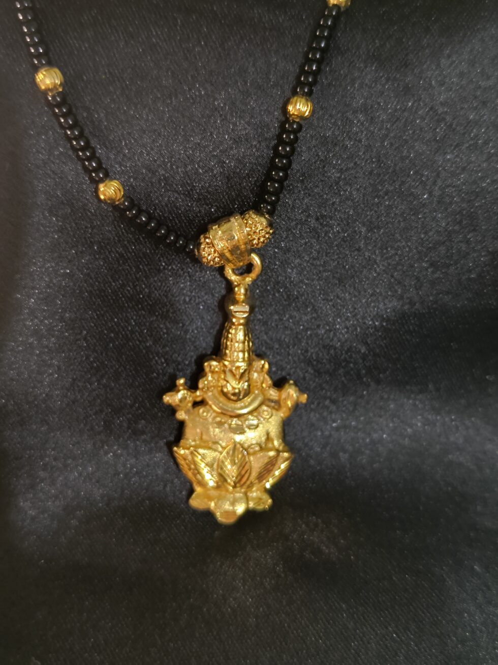Lord Brahma gold and black beaded necklace