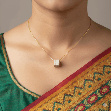 gold-plated chain with cube shaped pendant