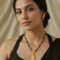 Lord Brahma gold and black beaded necklace